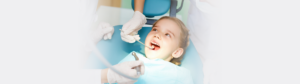 Little girl at an appoint with a dentist for kids at Erin Mills Smiles Dentistry.